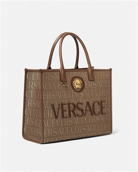 versace patent leather tote bag in powder pink|Versace allover large tote bag.